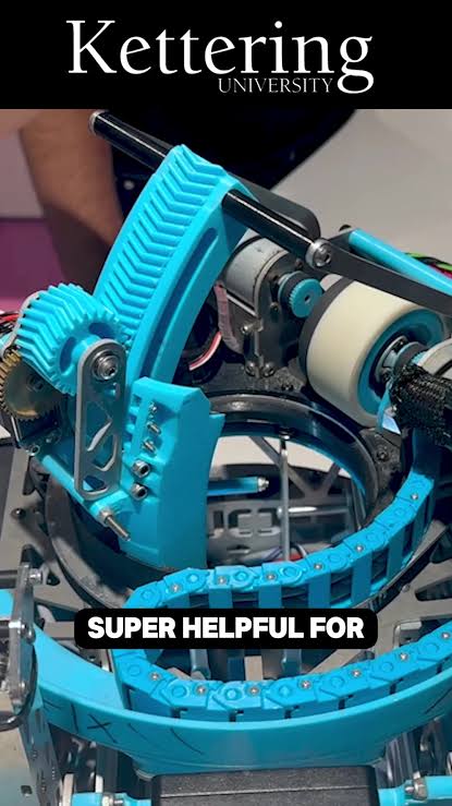 Cyan robot mechanism with highlighted rack, gear, housing, and curved guides